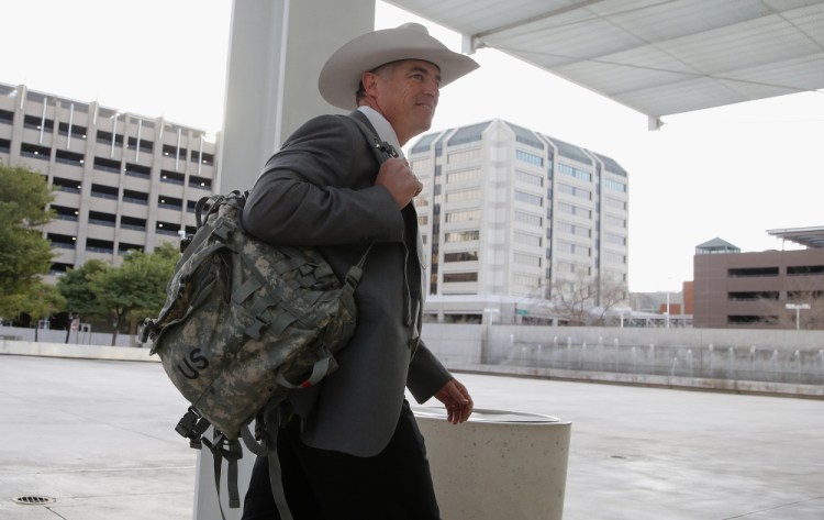 In this Jan. 28, 2016, file photo, Texas Ranger Nick Hanna, who was involved in the case against Warren Jeffs on the Fundamentalist Church of Jesus Christ of Latter Day Saints sect compound near San Angelo, Texas in 2008, arrives at the Sandra Day O’Connor U.S. District Court.