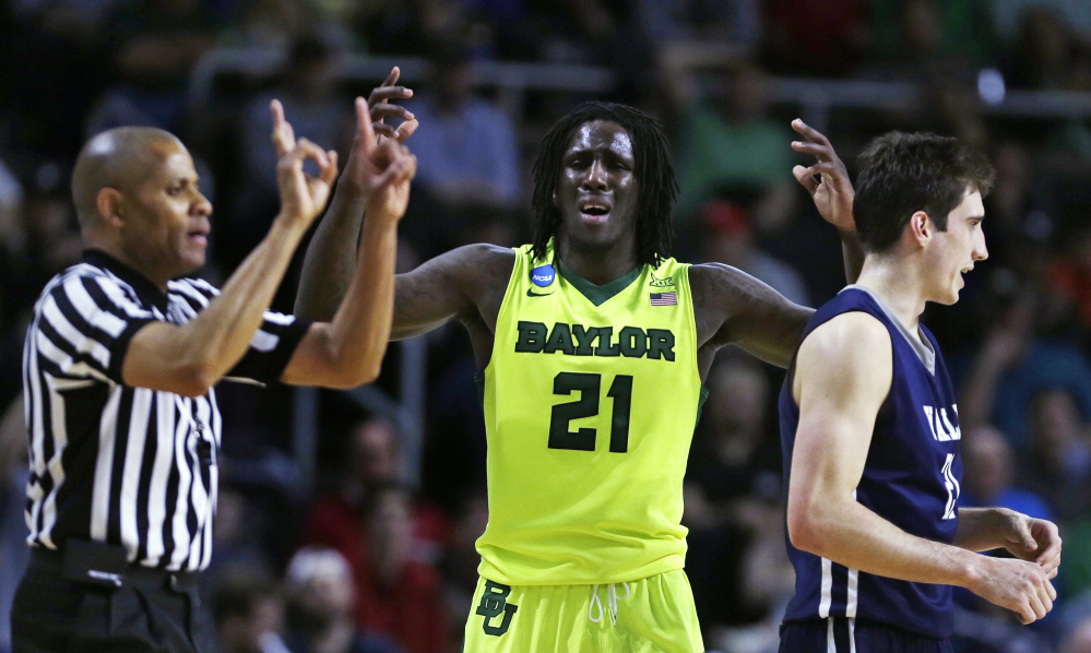 Baylor forward Taurean Prince reacts as he is charged with a foul in the second half against Yale on Thursday. The fifth-ranked Bears were ousted by No. 12 Yale, 79-75, in Providence, R.I.