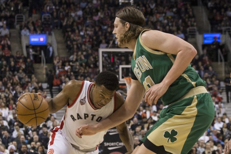 Toronto’s Kyle Lowry drives against the Celtics’ Kelly Olynyk in second half of Toronto’s win. Lowry led the Raptors with 32 points, including 10 in a decisive stretch of the fourth quarter.