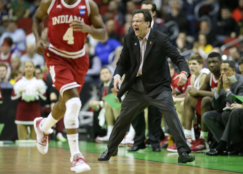 Indiana Coach Tom Crean directs his players during a second-round game against Kentucky in the NCAA men’s basketball tournament Saturday in Des Moines, Iowa. Indiana advanced to the Sweet 16 with a 73-67 win.
