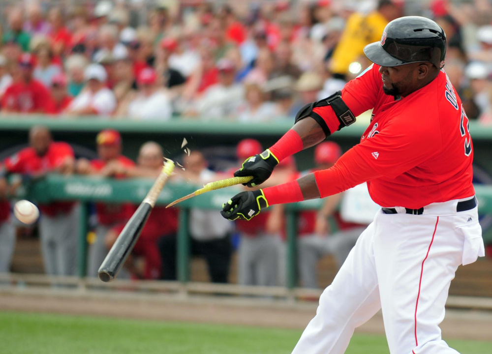 Red Sox DH David Ortiz breaks his bat in the second inning of Boston’s game against St. Louis on Saturday in Fort Myers, Fla. The game was called after five innings because of rain.
