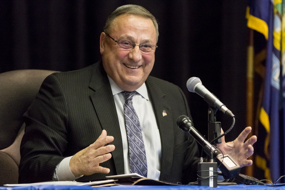 Gov. Paul LePage, speaking at a town hall-style meeting in Mexico on Tuesday, said Democrats have pursued alternative energy, thereby increasing energy costs and hastening the demise of the paper industry.