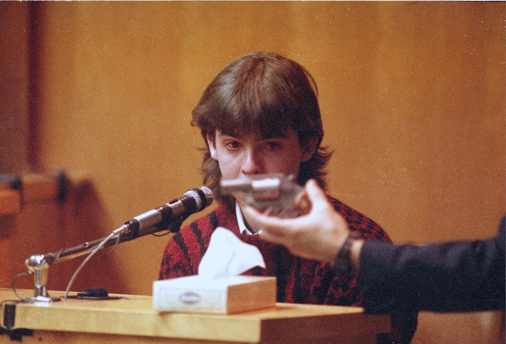 William Flynn is shown the gun he used to kill Gregory Smart at his trial in Rockingham County Superior Court in Exeter, N.H. A judge has ruled the gun used to kill Pamela Smart's husband in 1990 in a lurid case that inspired sensational media coverage will be returned to its owner.