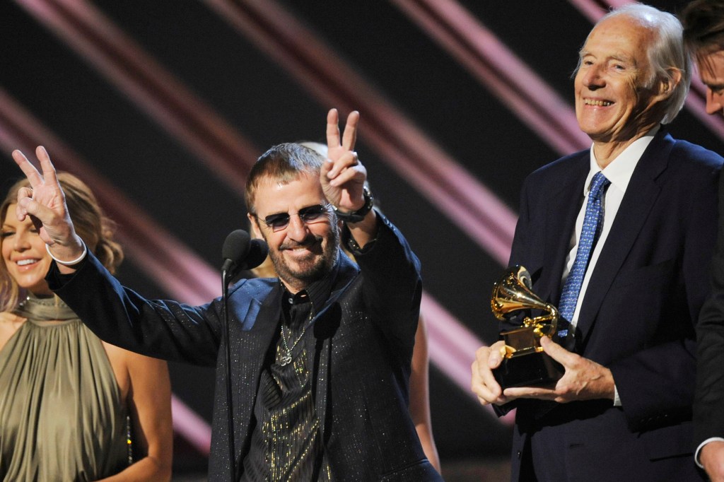 Ringo Starr and Beatles producer Sir George Martin accept the best compilation soundtrack album award for "Love" during the 50th annual Grammy awards In this Feb. 10, 2008, photo.  The Associated Press