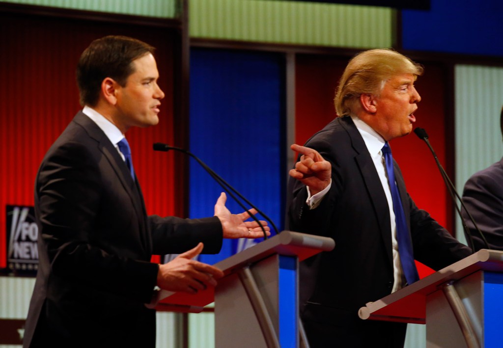 Marco Rubio and Donald Trump argue, as they did through much of Thursday night's debate in Detroit.
The Associated Press