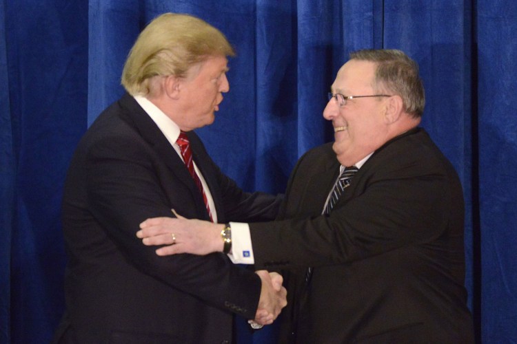 Republican presidential candidate Donald Trump shakes hands with Maine Gov. Paul LePage during a March campaign appearance in Portland.