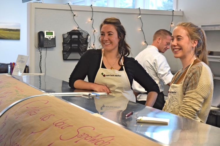 New Beet Managing Partner Jamie Pacheco, left,  and Cara Teggerrsell, an employee and barista, are shown behind the counter at the new store and cafe at Brunswick Landing. Courtesy photo