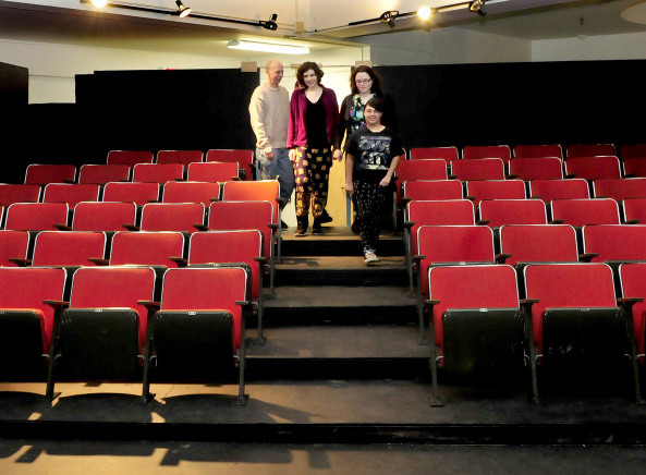 Out & Allied Youth Theatre members walk down the aisle in the theater in The Center in Waterville on Thursday. From left are Mark Fairman, Lily Fernald, Katie Howes and Rory Romero.