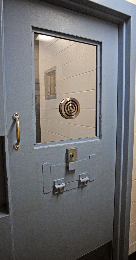AUGUSTA, ME - JAN 15: This cell has been modified with a large slot in the door so that meals can be passed in with out having to enter it is seen on Thursday January 15, 2015 at the Kennebec County Correctional Facility in Augusta. The same feature can be used to handcuff inmates before letting them out. (Photo by Joe Phelan/Staff Photographer)