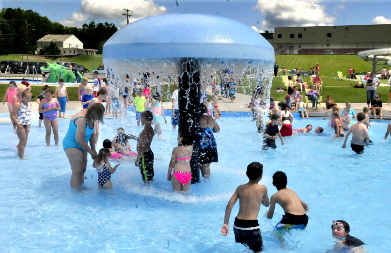 Kids filled the large pool to cool off and play at the Alfond Municipal Pool in Waterville last June. The City Council Tuesday will consider hiring an engineer to evaluate the North Street Park pool's condition.