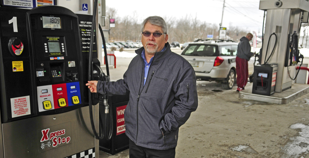 John Babb, president of J&S Oil, talks about converting the credit and debit card system to chip system during an interview on Feb. 10 at the company's Xpress Stop store in Manchester.