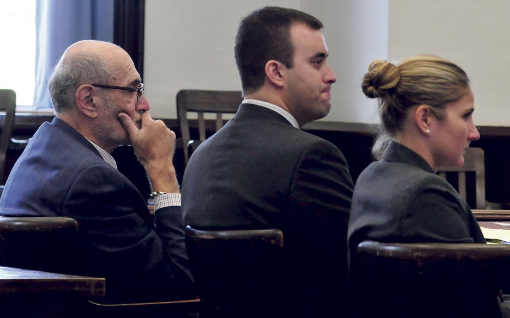 Defendant Andrew Maderios, center, and his attorneys, Leonard Sharon and Caleigh Milton, listen to the victim make statements at Maderios' sentencing hearing in September in Somerset County Superior Court. The former Pittsfield man, a former Nokomis High School music teacher, is serving three years in prison for domestic violence and assault convictions.