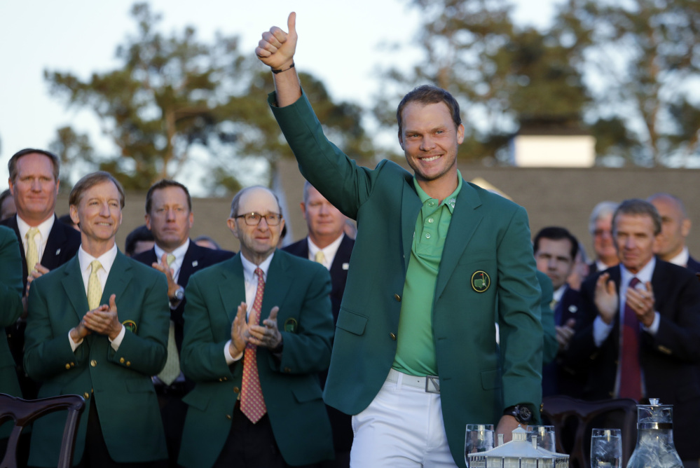 Masters champion Danny Willett gives a thumbs up after winning the Masters on Sunday in Augusta, Georgia.