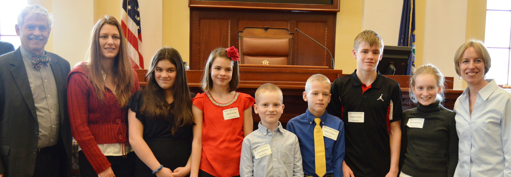 A group of homeschool students from Fayette were welcomed March 29 to the State House by Sen. Tom Saviello, R-Wilton. The students served as Honorary Pages for the day's legislative session, delivering documents and messages to senators and assisting the chamber staff with their daily duties. From left, are Saviello, Charity House, Natalie House, Olivia House, Jonah Sparling, Owen House, Clayton House, Jaina Sparling and Molly Sparling.