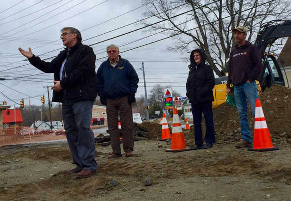 Oakland Town Manager Gary Bowman, left, speaks during a groundbreaking ceremony Monday morning marking the start of construction of a police station.