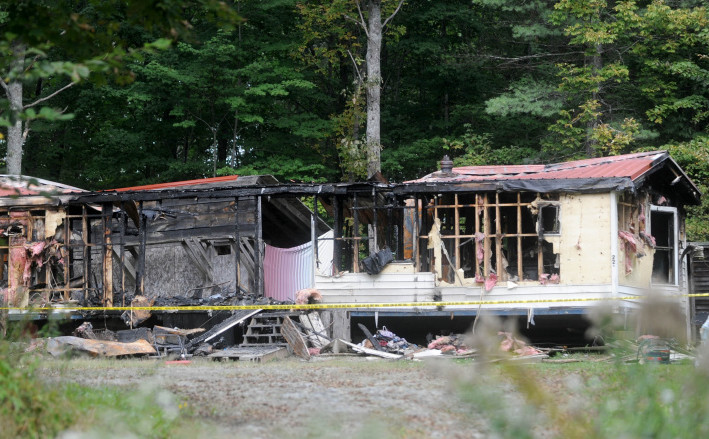 A Canaan man charged with arson in a September fire that destroyed a mobile home in Canaan and killed several pets is facing new charges.