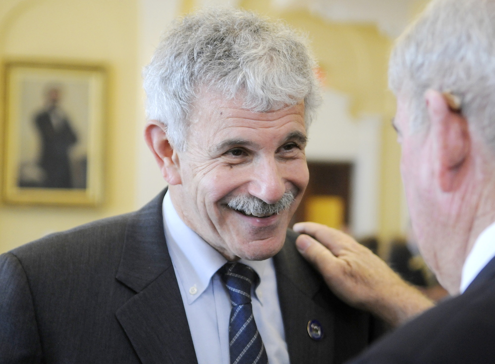 Sen. Roger Katz, R-Augusta, left, shown in 2015 at the State House.