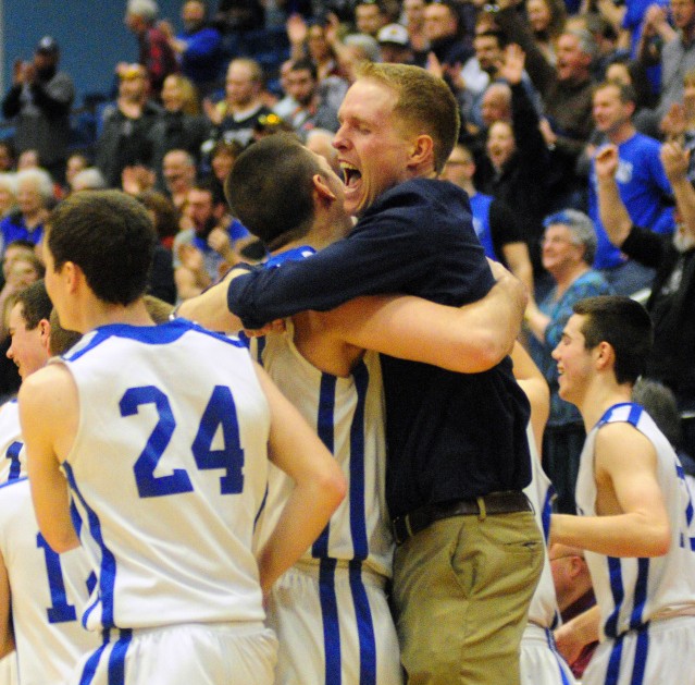 Staff file photo by Joe Phelan
Valley coach Luke Hartwell celebrates with his players after the Cavaliers beat Easton in the Class D state championship game on Feb. 27 at the Augusta Civic Center. Hartwell recently resigned, the school announced Wednesday.