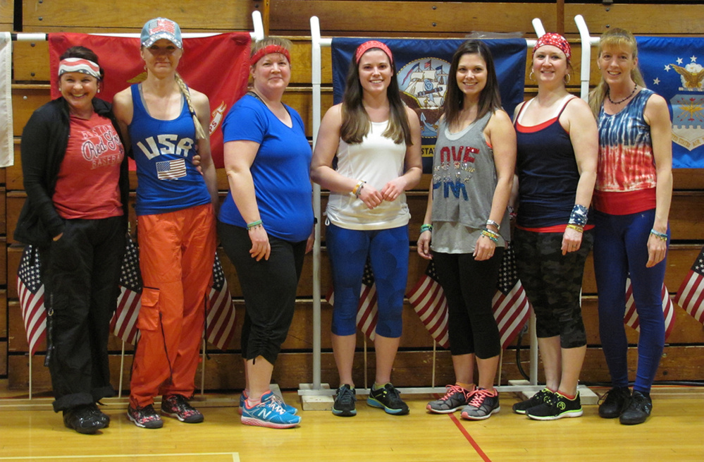 Seven instructors lead Zumba-Thon participants, included, from left, Monica Gilbert Beach, Carol Later-Carl, Lisa Berry, Katie Bussiere,  Hillary White, Tiara Nile, organizer; and Suzanne Lamb.