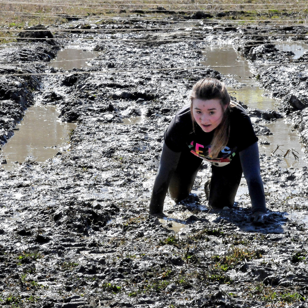 Hundreds have fun in the mud at Thomas College