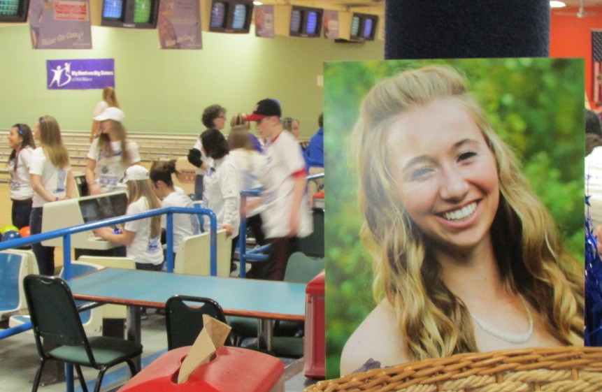 Bowlers take to the lanes last year in a Bowl for Cassidy's Sake fundraiser that raised $36,000 for Big Brothers Big Sisters. Cassidy Charette, seen in foeground photo, was about to become a Big Sister when she was killed in a hayride accident in October 2014. Big Brothers Big Sisters plans to present a posthumous award to her Saturday at the REM Awards 2016, recognizing the community volunteer effort that has blossomed in her memory.