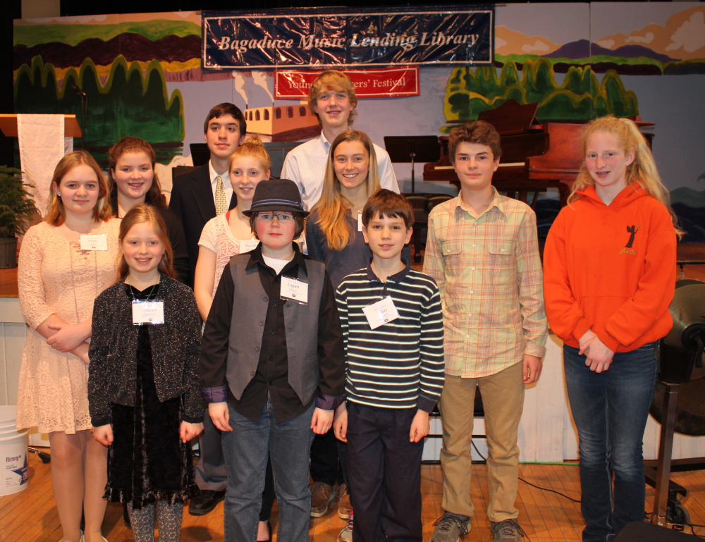 The 2016 Young Composers Competition & Festival attendees, front from left, are Maya Falstich, Logan Peters and Silas Bartol; middle, from left, are Amie Giles, Rachel Whitmore, Anikka Reinwand, Cameron Stewart and Alexandria Mason; and back, from left, are Samantha Dudley, Hayden Stacki and Soren Nyhus.
