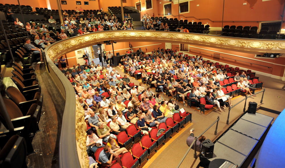 People take their seats in July 2014 for the opening night for the Maine International Film Festival at the Waterville Opera House. Both the Opera House and the Maine Film Center are among those who will share $510,000 from Waterville Creates!