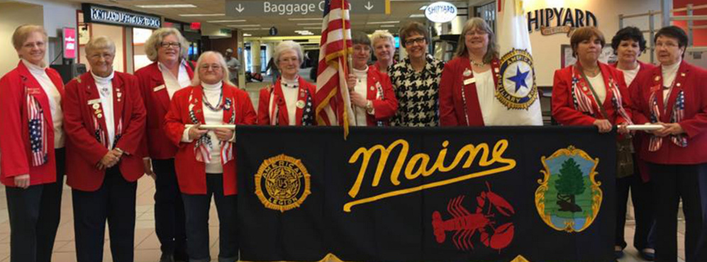 American Legion Auxiliary, Department of Maine hosted National President Sharon Conatser April 8-9 during a stopover in her year-long nationwide tour to call on community members. Several members of the Maine American Legion Auxiliary greeted National President Sharon Conatser upon her arrival at the Portland Jetport. From left are Mary Jane McLoon, Elizabeth Seeley, State President Debra Ann Marr, Linda Roberts, Theresa Owen, Charlotte Doyle, Jeri Brooks Greenwell, Conatser, Ann Durost, Pam Johnson, Joan Caron and Nancy Ronco.