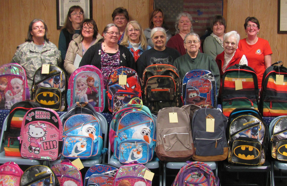 Members of the American Legion Auxiliary Unit 39 from Madison recently filled  20 backpacks as part of the Children and Youth Month observance by the American Legion Auxiliary. In front, from left, are Nancy Misiaszek, Kathleen Randall, Sandy Ingalls, Maxine Dube, Merrilyn Vieira and Betty Dow. In back, from left, are Cindy Badger, Pat Santoni, Robin Turek, Lynn Boucher, Sharon Mellows, Tena Ireland and Harriet Bryant.