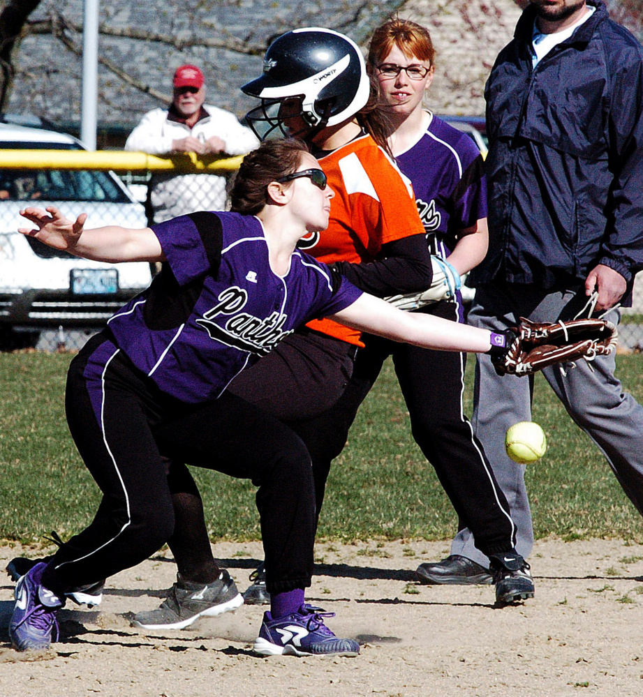 Gardiner's Bri Brochu makes it to second base as Waterville's Shelby Place attempts to tag her out Wednesda in Waterville. Rebecca Oakes backs up the play.
