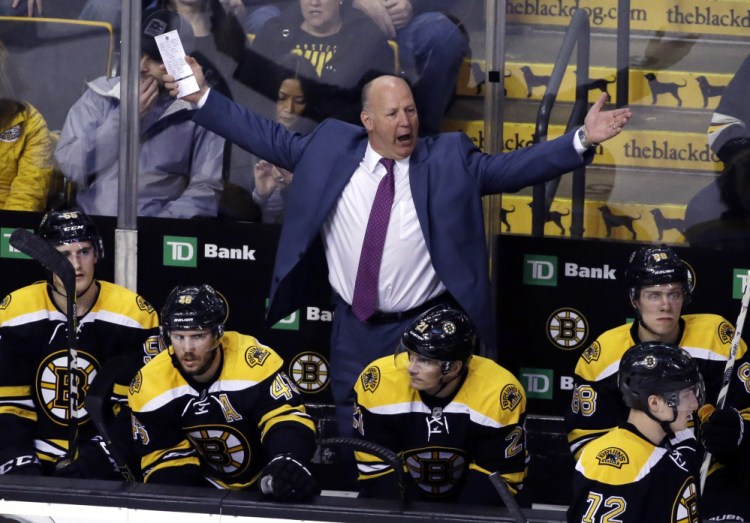 Bruins coach Claude Julien yells at the officials after they disallowed an apparent goal in the third period of a March 24 game against the Florida Panthers. The Bruins ended up losing their fifth straight game, 4-1.
