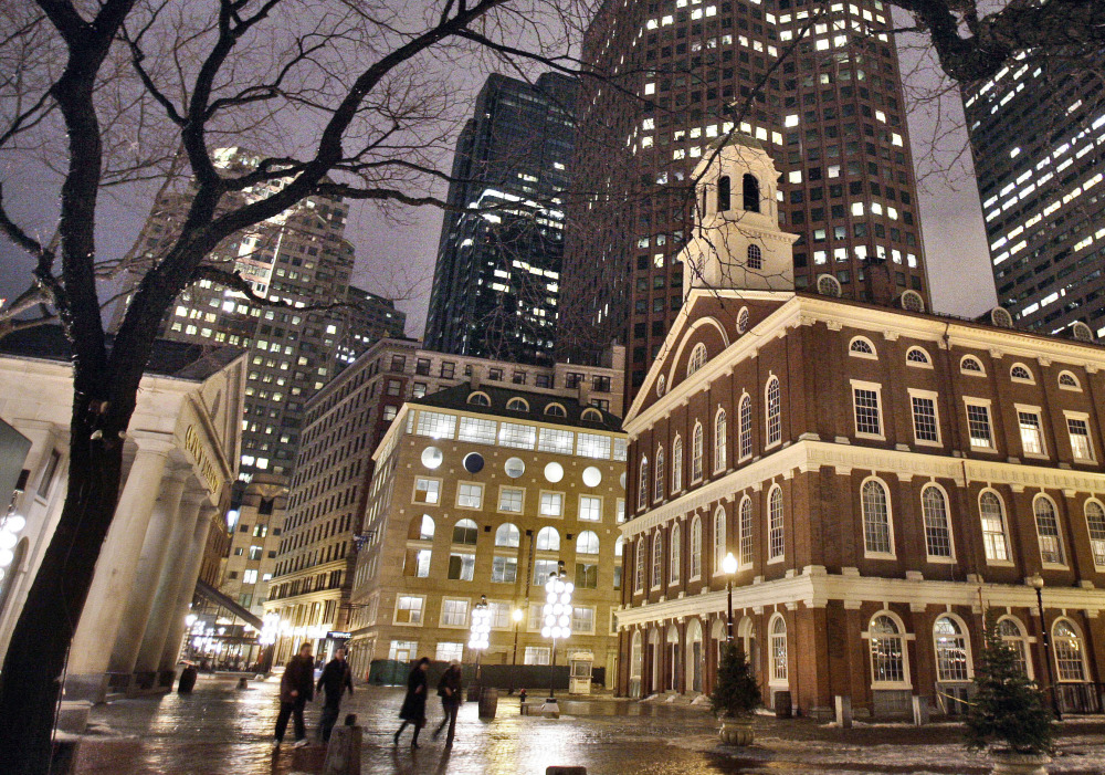 Faneuil Hall, right, one of the sites on Boston's Freedom Trail, is among the buildings under threat from rising sea levels.