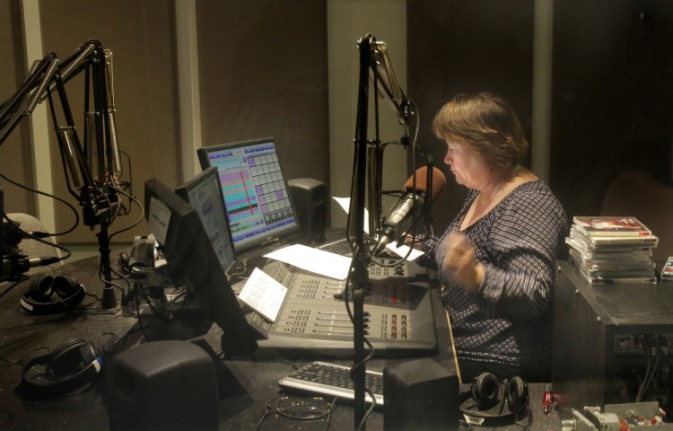 Robin Rilette hosts her morning classical music program in the Portland studios of the Maine Public Broadcasting Network on Tuesday. Starting May 9, her show will be carried on MPBN's new 24-hour classical music service, called Maine Public Classical, which will be available on stations in Waterville, Bangor and Fryeburg, as well as online and on HD radios. Gregory Rec/Staff Photographer