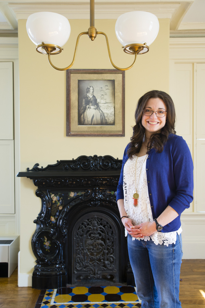 Bowdoin senior Katie Randall, who researched the Harriet Beecher Stowe House and helped get it listed on the Underground Railroad Network of Freedom, stands in "Harriet's Writing Room," a new exhibit that will open to the public next month.