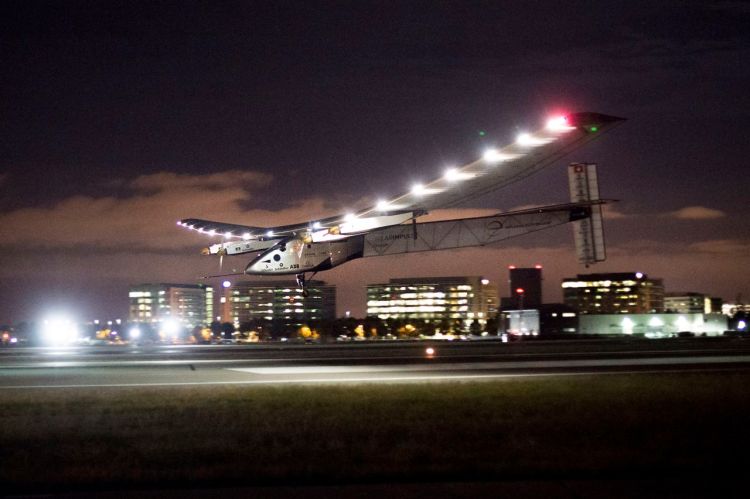Solar Impulse 2 lands at Moffett Field in Mountain View, Calif., on Saturday. The plane completed a risky, three-day flight across the Pacific Ocean as part of its journey around the world. The Associated Press