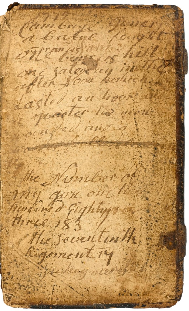This inscribed pocket Bible carried by a Massachusetts soldier during the Battle of Bunker Hill on June 17, 1775 will be auctioned next week in New York.  A  rare newspaper printing of a journal kept by a young George Washington and the bible are among hundreds of historic documents being sold at a New York City auction.  