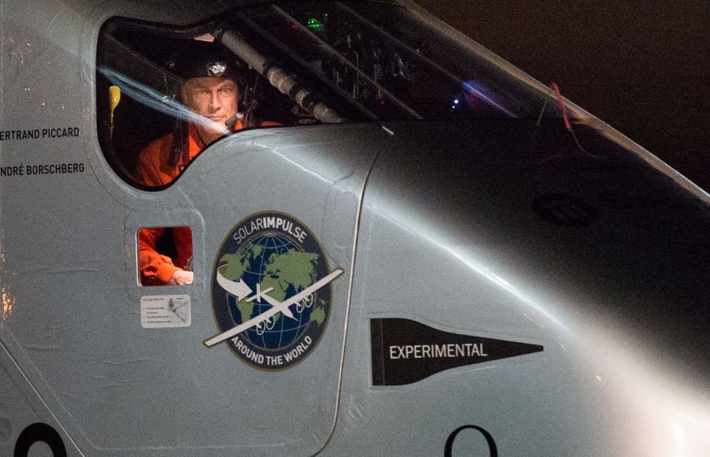 Solar Impulse 2 pilot Bertrand Piccard looks out his cockpit window shortly after landing at Moffett Field in Mountain View, Calif., on Saturday. The Associated Press