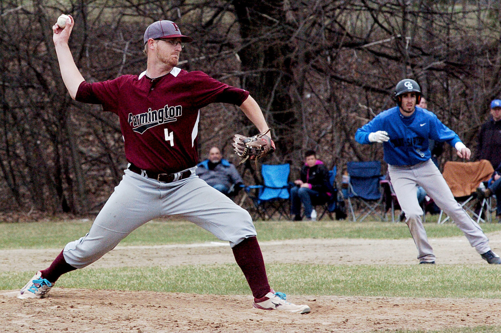 University of Maine at Farmington pitcher Kyle Peterson throws to a Colby-Sawyer batter during the first game of a doubleheader Sunday in Farmington.