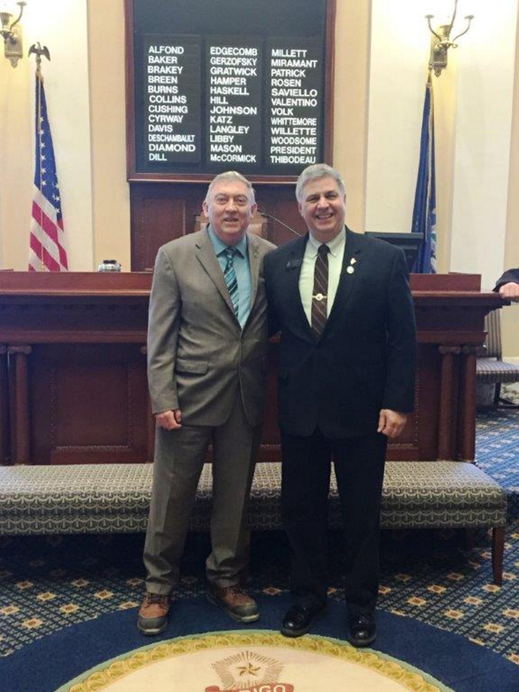 The Rev. George Sadlo served as Pastor of the Day and delivered the morning prayer in the Senate April 12 at the State House in Augusta. From left are Sadlo and Sen. Scott Cyrway, R-Benton.