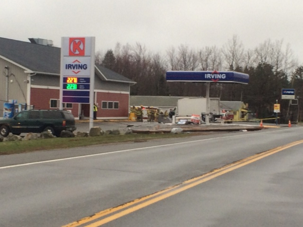 A box truck veered off Route 3 on Tuesday morning in Liberty, crashing into utility poles and fuel pumps at a Circle K store and Irving station.