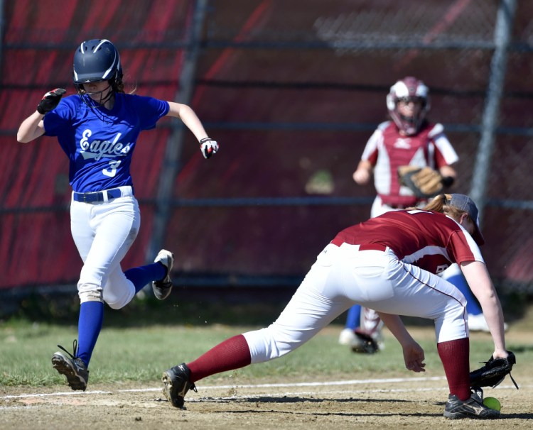 Messalonskee's Mackenzie Charest (3) beats out the throw to Bangor's Jenna Bishop (11) at first base Friday in Oakland.
