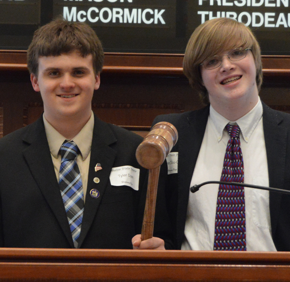 Maranacook Community High School students Tyler Dunn and Gavin Diou-Cass served as Honorary Pages for the day's legislative session on April 12 at the State House. From left are Dunn and Diou-Cass.