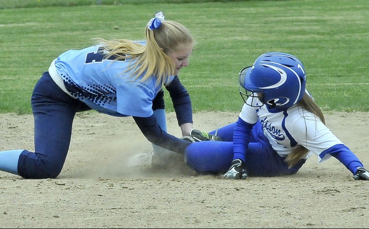 Madison runner Sydney LeBlanc slides safely into second base as Telstar's Lisa Gammon applies the tag during a Mountain Valley Conference game Monday in Madison. The Bulldogs won 3-1.