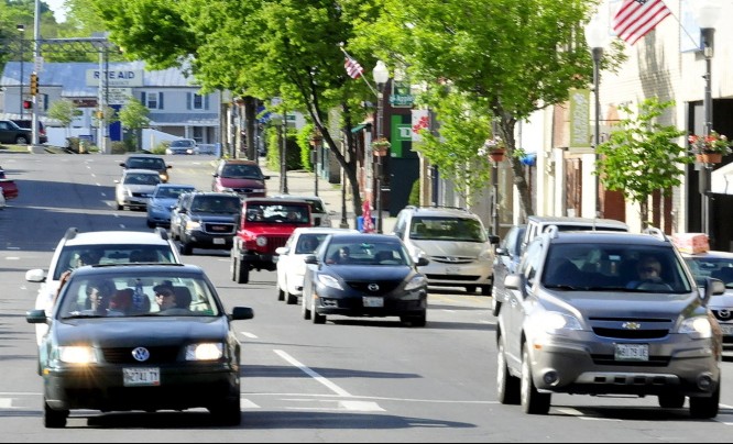 Traffic moves through downtown Waterville on the one-way Main Street. City officials are exploring ideas to return Main and Front streets to two-way traffic to ease congestion, slow traffic down and encourage shoppers to patronize downtown businesses.