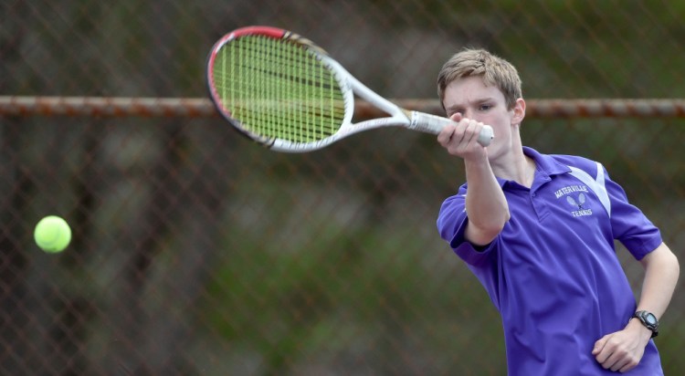 Bridger Holly returns a shot from Belfast's Wendall Gratton during a tennis match Tuesday at the North Street courts in Waterville. Bridger won 6-0, 6-2.