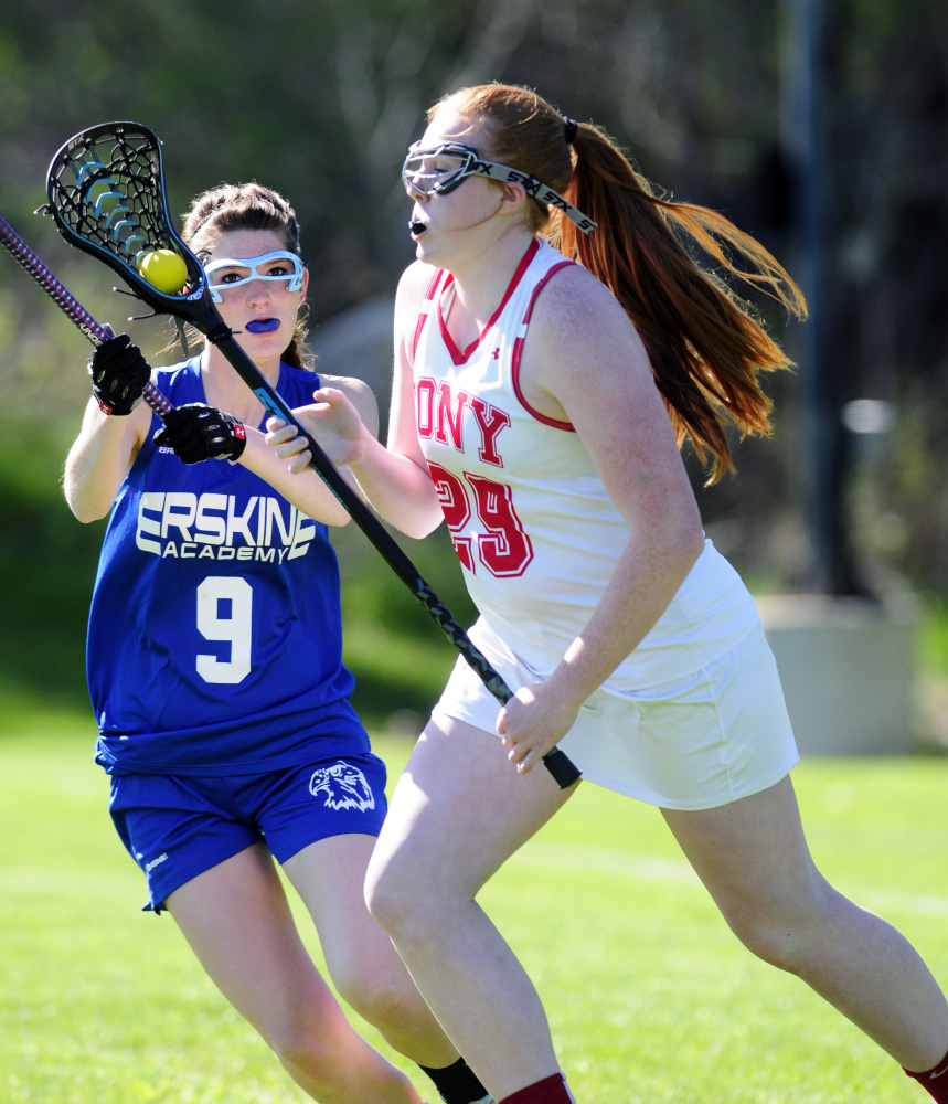 Staff photo by Joe Phelan
Erskine's Renee Beaudoin, left, defends Cony's Lauren Coniff during a game Tuesday in Augusta.