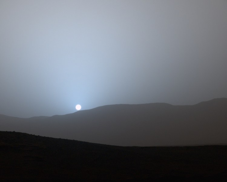 NASA's Curiosity Mars rover recorded this view of the sun setting at the close of the mission's 956th Martian day, or sol (Earth date April 15, 2015), from the rover's location in Gale Crater.