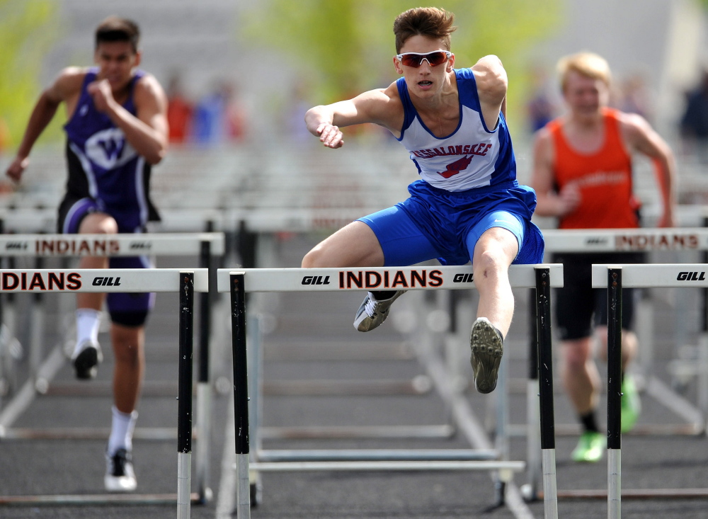 Messalonskee High School's Tanner Burton leads the way in the 110-meter hurdles race at the Community Cup last season. The 12th annual Community Cup is set for Friday in Waterville.
