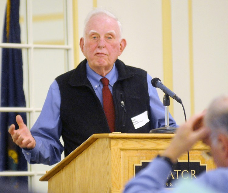 Jack Sutton, of the Maine Rail Group, addresses participants at a rail summit Tuesday in Augusta.