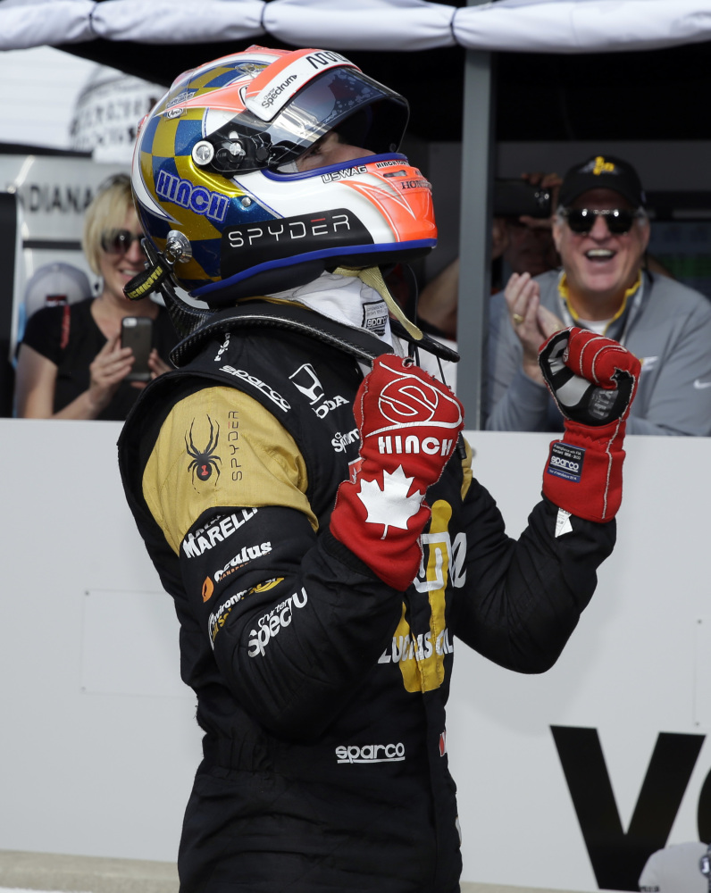 James Hinchcliffe celebrates  after winning the pole during qualifying for the Indianapolis 500 at Indianapolis Motor Speedway on Sunday in Indianapolis.